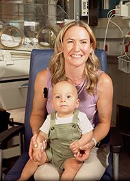 mother and son smiling